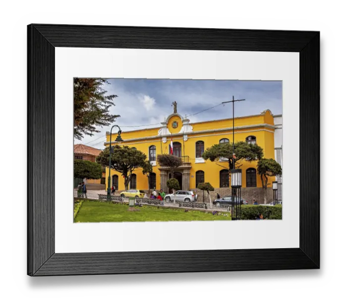 Framed Print : Yellow building with flags in an urban environment Framed Print : Yellow building with flags in an urban environment