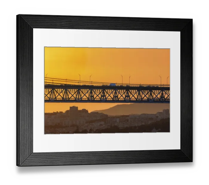 Framed Print : Beautiful view of golden sunset and suspension city bridge with its steel structure and cables