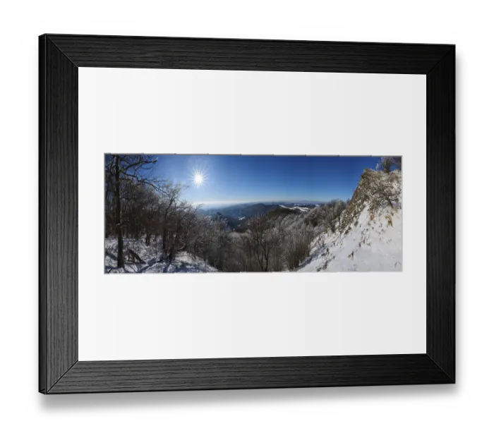 Framed Print : View over the hills and valleys from the mountain with hoarfrost on the branches in winter Framed Print : View over the hills and valleys from the mountain with hoarfrost on the branches in winter