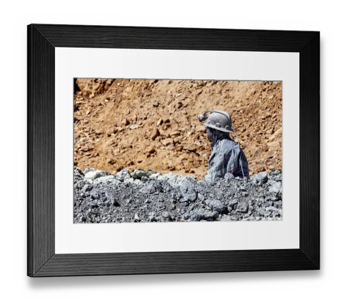 Framed Print : A miner gazes into the distance