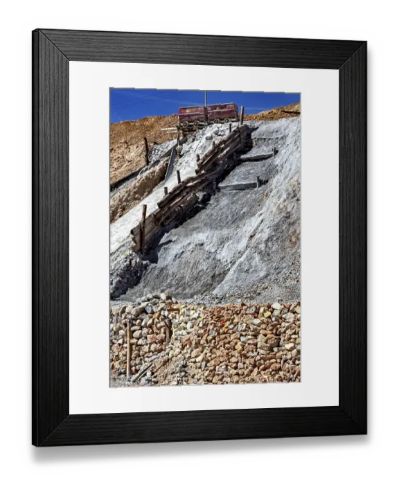 Framed Print : A lonely mine car stands on a rocky slope Framed Print : A lonely mine car stands on a rocky slope