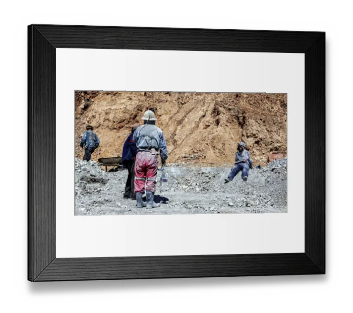 Framed Print : Miners in different clothes stand or sit in a barren Framed Print : Miners in different clothes stand or sit in a barren