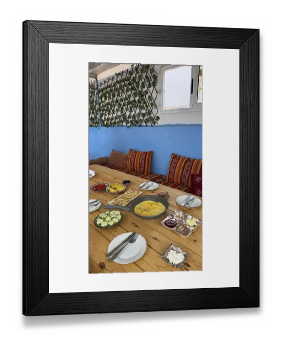Framed Print : Rustic wooden table features a spread of moroccan breakfast food