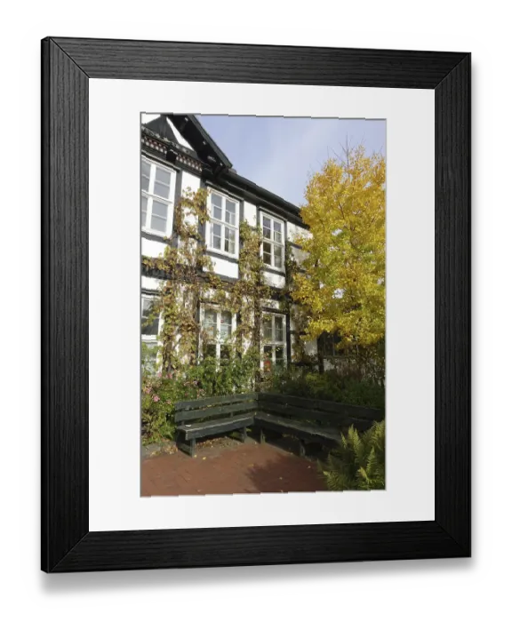 Framed Print : Historic pharmacy in a half-timbered house