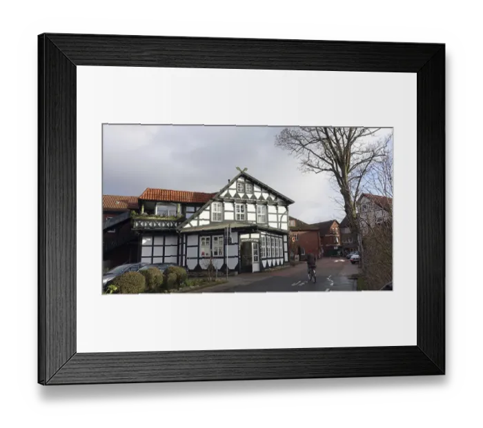 Framed Print : Historic pharmacy in a beautiful half-timbered house