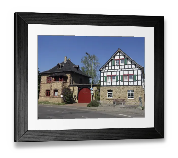Framed Print : Two old quarrystone and half-timbered houses