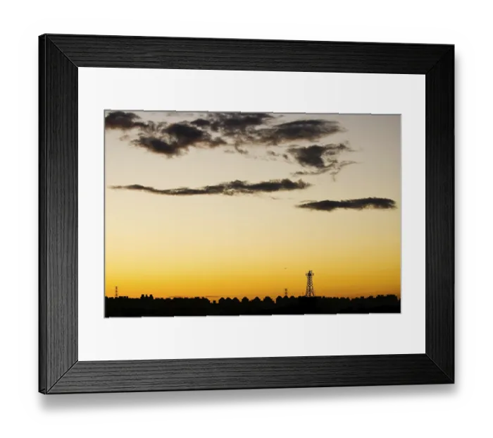 Framed Print : Cell phone station and city skyline under sunset Framed Print : Cell phone station and city skyline under sunset