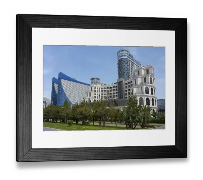 Framed Print : Modern high-rise buildings with glass facades in an urban setting