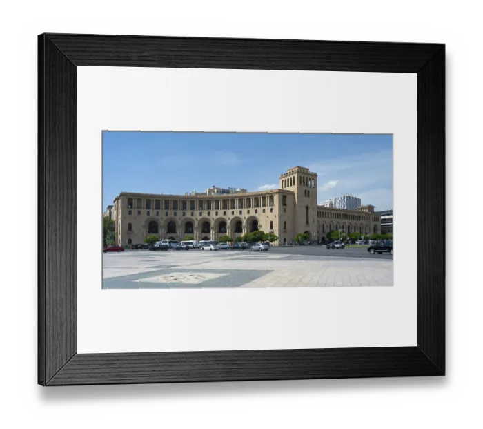 Framed Print : Elongated stone building with arches