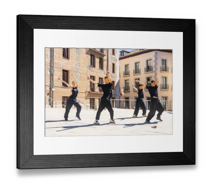 Framed Print : Group of diverse urban dancers performing synchronized street dance movements with raised arms Framed Print : Group of diverse urban dancers performing synchronized street dance movements with raised arms