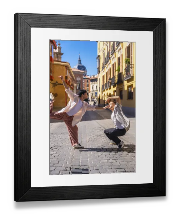 Framed Print : Two young men expressing emotion and movement through a modern dance routine on a cobblestone street Framed Print : Two young men expressing emotion and movement through a modern dance routine on a cobblestone street