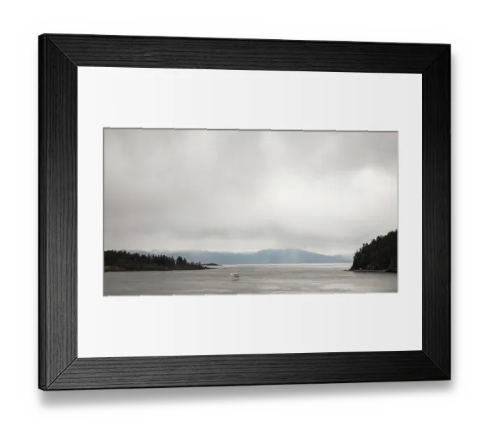 Framed Print : Calm water with distant mountains and a small float plane under an overcast sky in Nanaimo Framed Print : Calm water with distant mountains and a small float plane under an overcast sky in Nanaimo