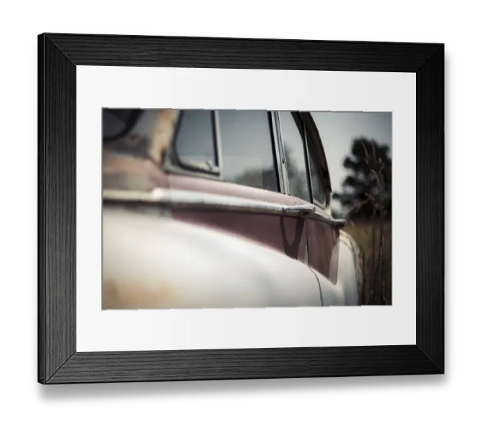 Framed Print : Side view of a vintage Jaguar car's rear window Framed Print : Side view of a vintage Jaguar car's rear window
