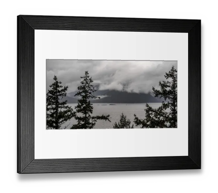 Framed Print : Moody landscape with a misty lake