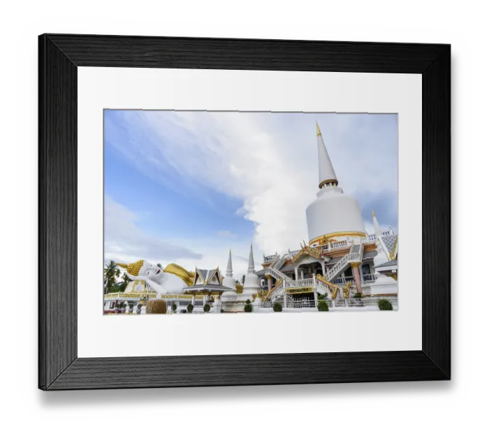 Framed Print : Large white pagoda and Buddha statue under the blue sky in the evening at Wat That Noi