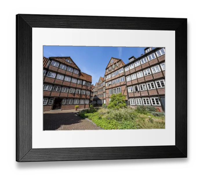 Framed Print : Facades of the historic brick buildings