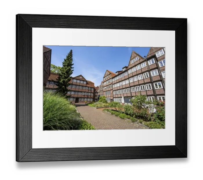 Framed Print : Facades of the historic brick buildings