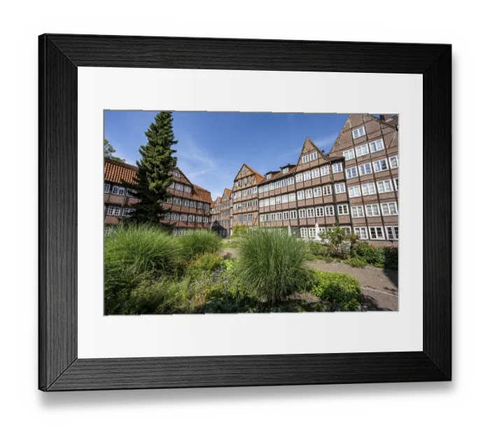 Framed Print : Facades of the historic brick buildings