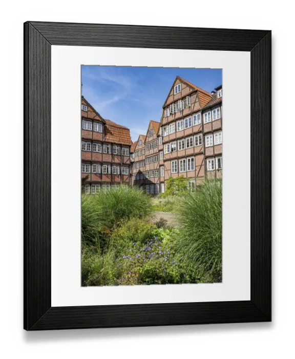 Framed Print : Facades of the historic brick buildings