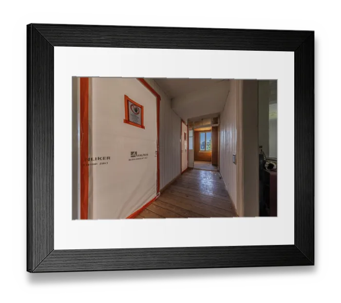 Framed Print : Corridor with protection during asbestos removal of a multi-storey residential building built in 1903 prior to