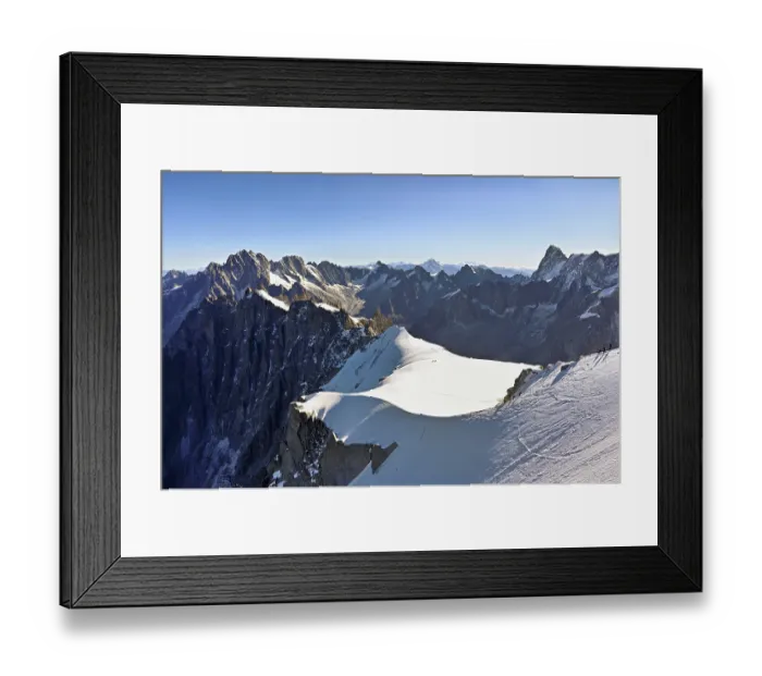 Framed Print : Mountaineers climb over a snow-covered ridge Framed Print : Mountaineers climb over a snow-covered ridge