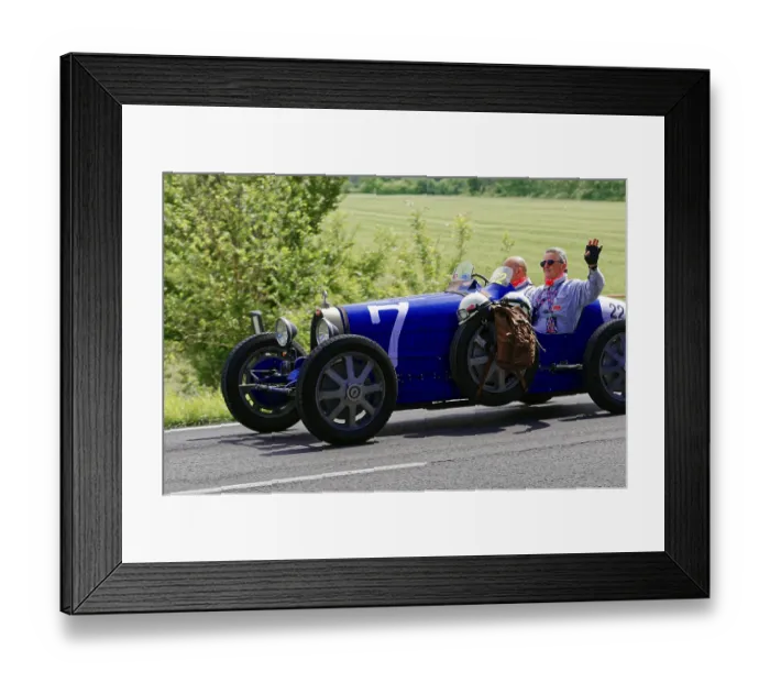 Framed Print : Blue classic car with two men on a country road under a sunny sky Framed Print : Blue classic car with two men on a country road under a sunny sky