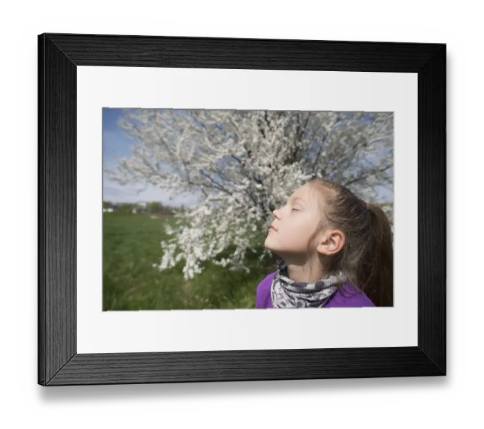 Framed Print : Child girl enjoying spring sun outdoor with closed eyes