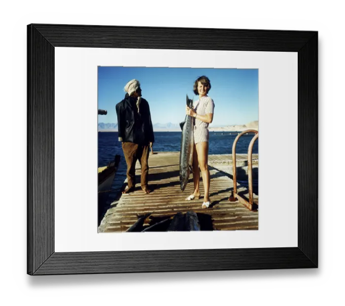 Framed Print : Woman and Egyptian with large captive barracuda