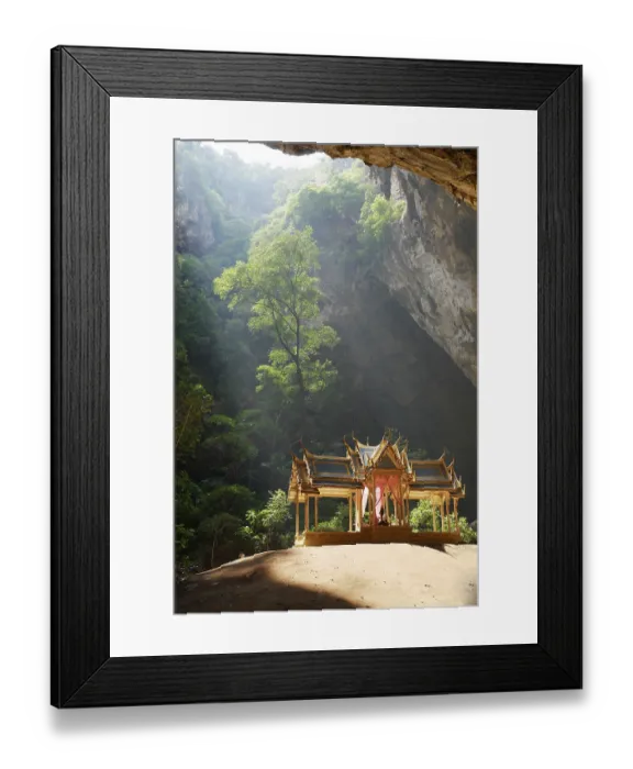 Framed Print : Buddhist temple in picturesque cave with sunlight