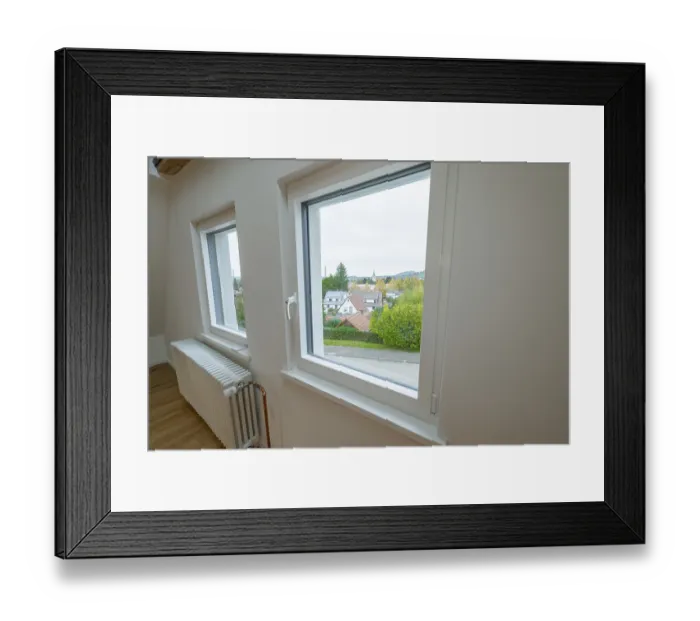 Framed Print : Bright room with white windows and views of residential buildings and greenery Framed Print : Bright room with white windows and views of residential buildings and greenery