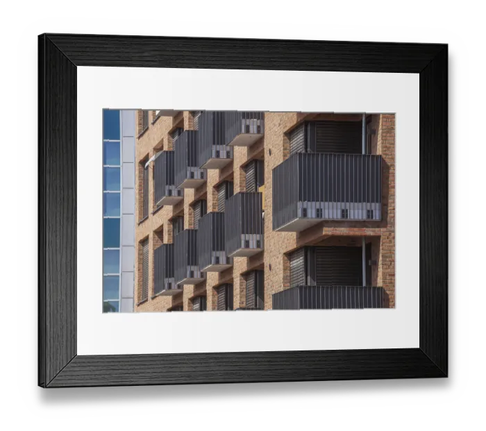 Framed Print : Modern brown brick residential buildings with balconies Framed Print : Modern brown brick residential buildings with balconies