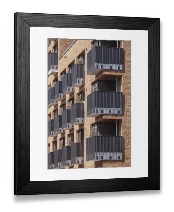 Framed Print : Modern brown brick residential buildings with balconies Framed Print : Modern brown brick residential buildings with balconies