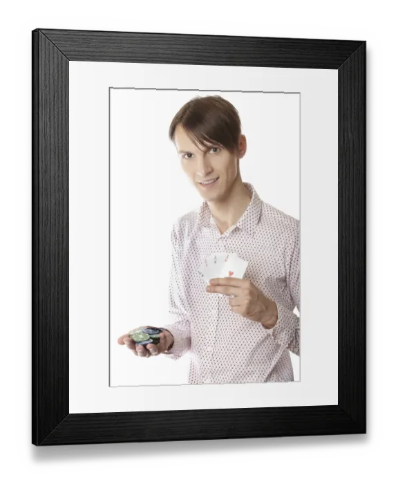 Framed Print : Smiling man holding poker cards and chips on a white background