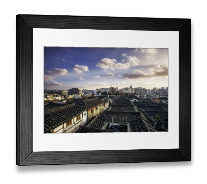 Framed Print : Bukchon hanok village taken at sunset in the famous bukchon observation cafe on top of the village