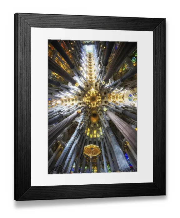 Framed Print : Tall columns line up the interior of sagrada familia with colorful lights from stained glasses