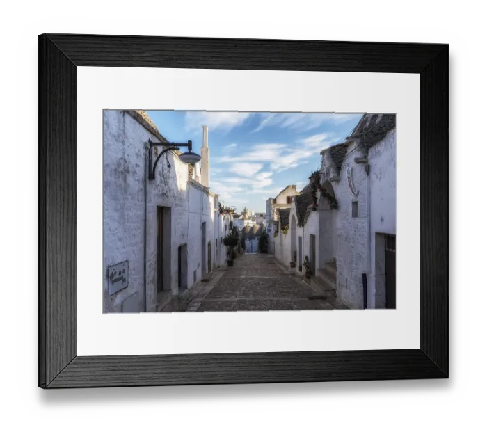 Framed Print : Empty streets of Alberobello in the morning