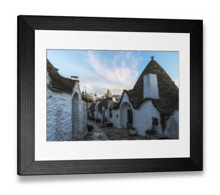 Framed Print : Empty streets of Trulli houses in Alberobello in the morning