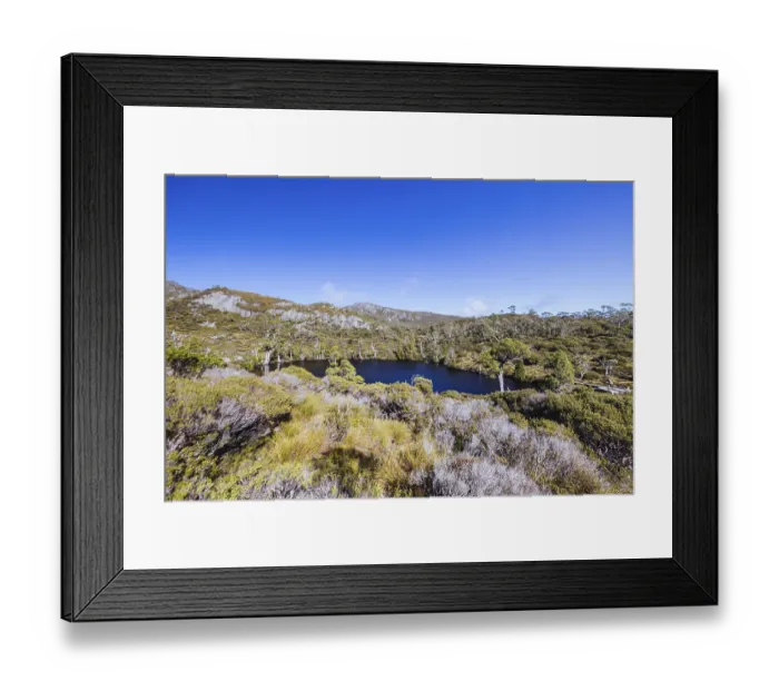 Framed Print : The view of mountain landscape around Wombat Pool on the Overland Track on a warm autumn morning in Cradle Mountain