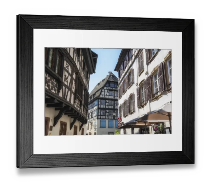 Framed Print : Strasbourg narrow alleyways in historical old town with half timbered houses