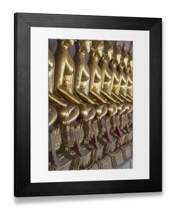 Framed Print : Gilded Buddha statues (Bhumispara mudra: Buddha Gautama at the moment of enlightenment)