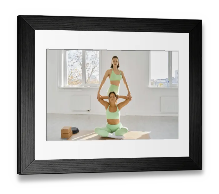 Framed Print : In a well-lit studio with large windows