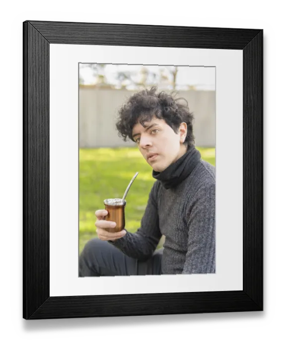 Framed Print : Man embracing the rich flavors of traditional yerba mate outdoors Framed Print : Man embracing the rich flavors of traditional yerba mate outdoors