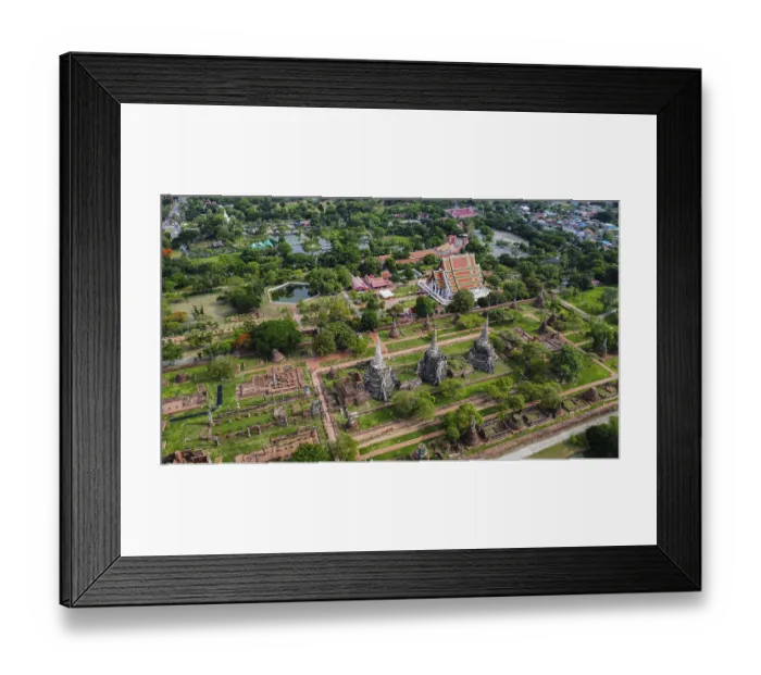 Framed Print : An ancient temple complex next to a city and a modern temple Framed Print : An ancient temple complex next to a city and a modern temple