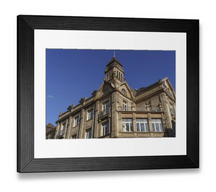Framed Print : Historic building with fine sandstone architecture under blue sky Framed Print : Historic building with fine sandstone architecture under blue sky