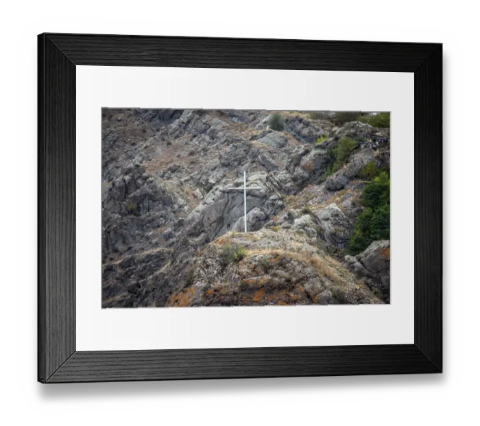 Framed Print : White commemorative cross on the top of the hill against the background of the mountain landscape Framed Print : White commemorative cross on the top of the hill against the background of the mountain landscape