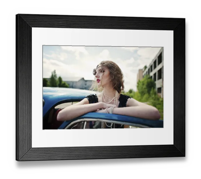 Framed Print : Portrait of beautiful curly fashion girl model with bright makeup in retro style leaned on a vintage car door Framed Print : Portrait of beautiful curly fashion girl model with bright makeup in retro style leaned on a vintage car door