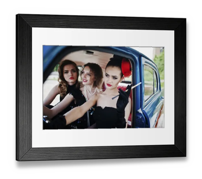 Framed Print : Three young girl in retro style dress seat on old classic vintage car