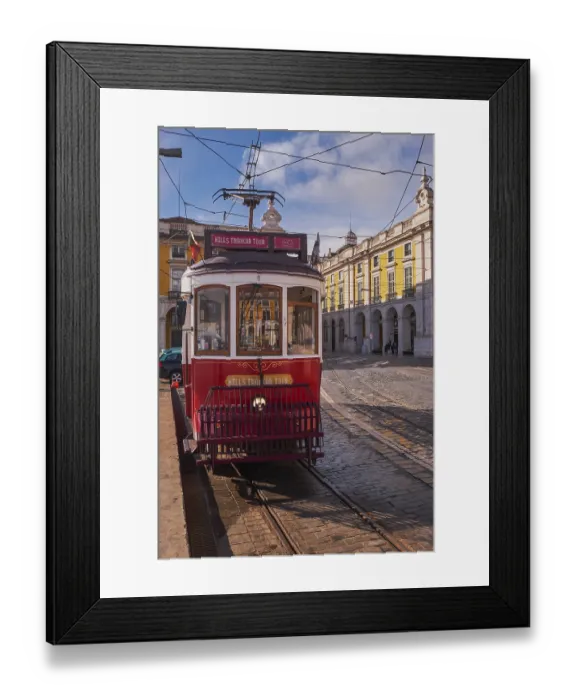 Framed Print : The Iconic and Famous Red Vintage Tram in Terreiro do Paco