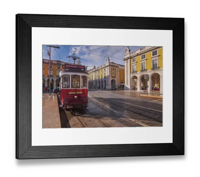 Framed Print : The Iconic and Famous Red Vintage Tram in Terreiro do Paco