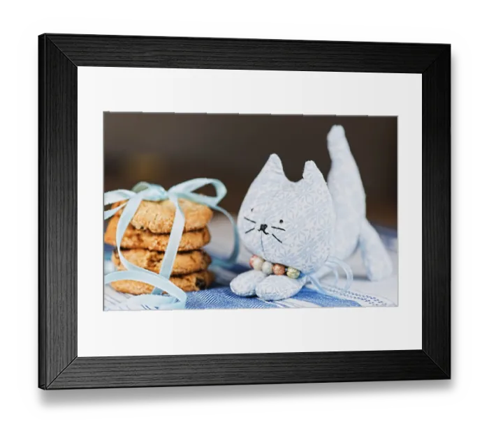 Framed Print : Homemade puppet, a cat and cookie on tablecloth Framed Print : Homemade puppet, a cat and cookie on tablecloth